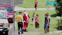 Mount Keira RFS and Santa spread joy through Figtree on December 23 for much-loved Lolly Drop.