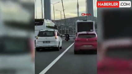 İSTANBUL-FIRTINADA KÖPRÜYÜ GEÇMEYE ÇALIŞAN MOTOSİKLETLİLERE KALKAN OLDULAR