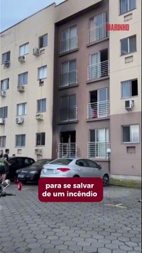 Mulher fica ferida após se jogar de prédio em chamas na Itaipava