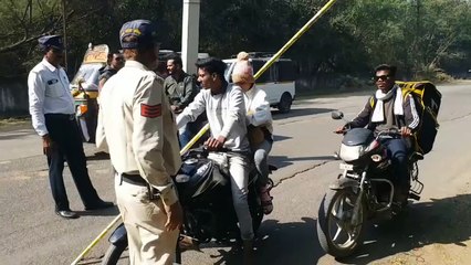 Fine imposed on vehicles without helmet and three passenger vehicles