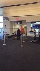 Gingerbread Man Spreads Christmas Cheer In The Airport