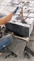 Manual cutting process of natural bluestone slabs