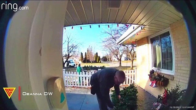 Delivery Man Fixes Christmas Tree Outside House Caught on Ring Camera | Doorbell Camera Video