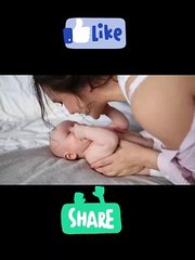 Cute baby playing with mother