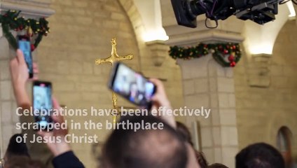 Sombre Christmas Eve in Bethlehem as Gaza war rages