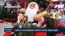 Santa Claus di pusat perbelanjaan Berbagi Hadiah Untuk Anak-Anak