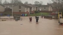 Dogs carried to safety as Storm Gerrit forces residents to evacuate Scottish town