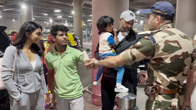 Airport Style: Harbhajan Singh, Geeta Basra, and Kids Snap Selfies with Fans