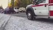 Truck driver loses control on icy road and crashes into police SUV