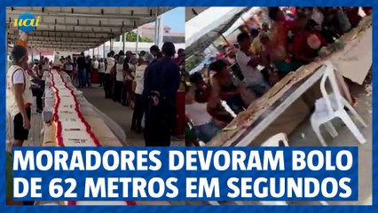 Moradores devoram bolo de 62 metros em segundos