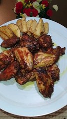 طريقة عمل اجنحة دجاج مشوية في الفرن