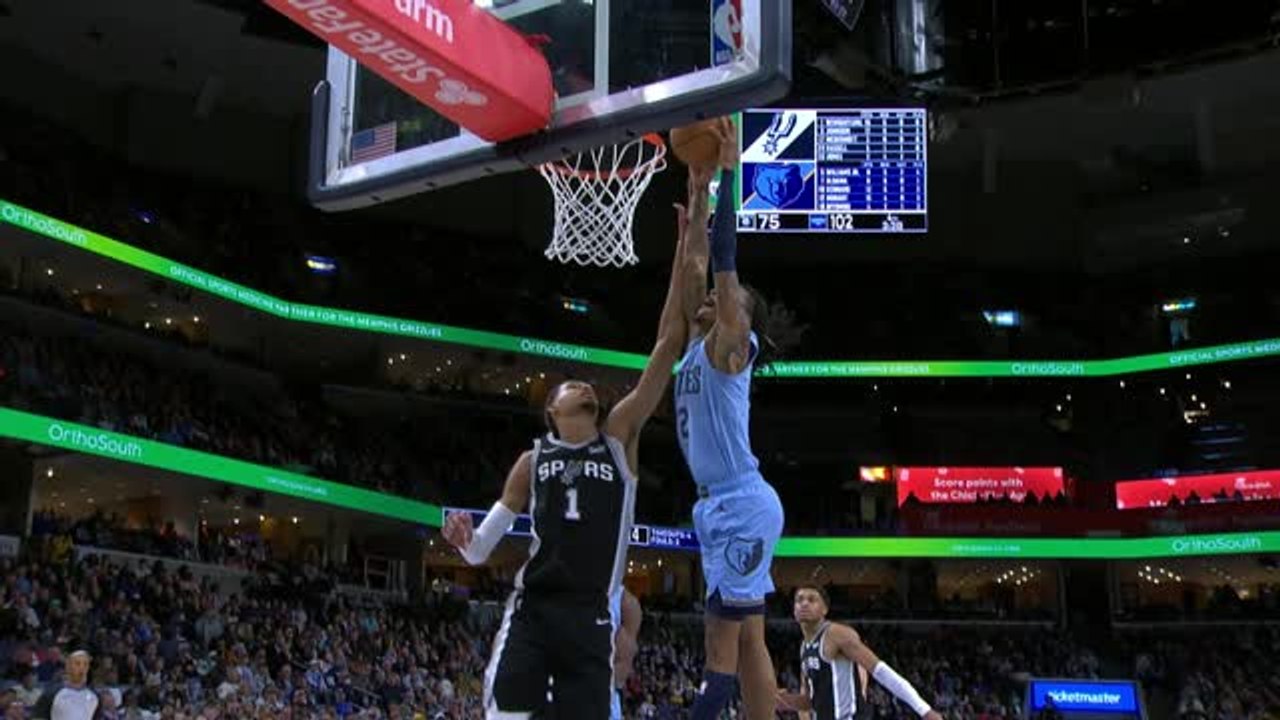 Morant dunks over Wembanyama