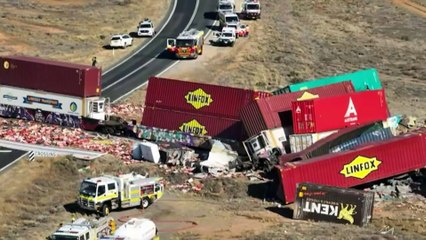 Truck driver charged over freight train crash which killed two workers