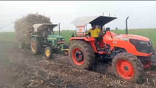 Kubota tractor video // John Deere tractor video// how to pull out stuck sugarcane load tractor//