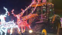 Beautifully decorated tractors plow ahead with Christmas charity run