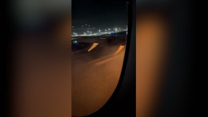 Footage from inside burning Japan Airlines plane shows moment aircraft catches fire