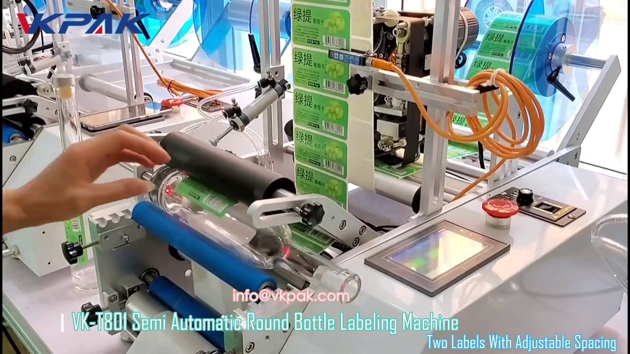Machine à étiqueter semi-automatique pour bouteilles rondes