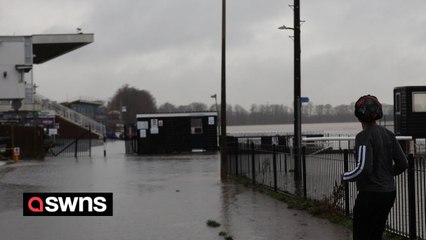 Torrential rain and blisteringly strong winds are battering Britain