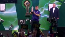 Luke Littler, 16, collects trophy after finishing runner-up in World Darts Championship