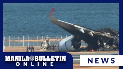 Plane wreckage after crash at Japan's Haneda airport