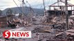 Japan quake: Wajima city folks return to their destroyed and razed homes