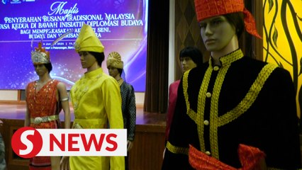 MOTAC hands over 20 sets of traditional, cultural fashion pieces to Wisma Putra