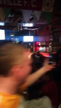 Language warning: Man with an 'assault rifle' dancing in a bar in Northern Ireland; police are investigating, source unknown