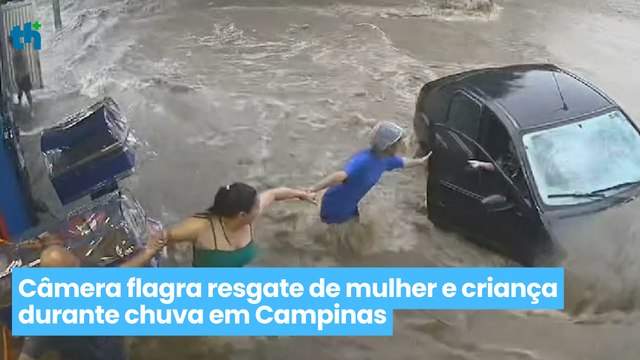 Corrente-humana para salvar vidas câmera flagra resgate de mulher e criança durante chuva em Campinas