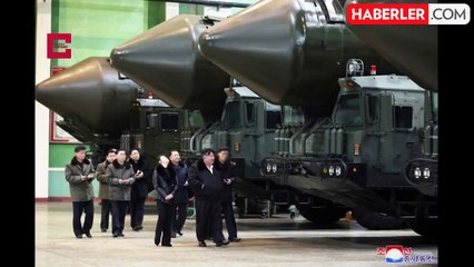 Kim Jong Un, ABD ve Güney Kore'yi ''yok etme'' tehdidinden günler sonra halefi olarak görülen kızı ile füze üretim tesisini ziyaret etti