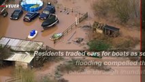 Flooding Forces Gloucestershire Locals to Navigate Streets by Boat