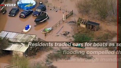 Flooding Forces Gloucestershire Locals to Navigate Streets by Boat