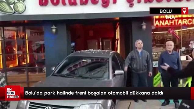 Bolu'da park halinde freni boşalan otomobil dükkana daldı
