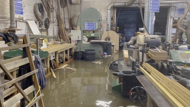Deep floodwater submerges Nottinghamshire workshop as UK hit by heavy downpours