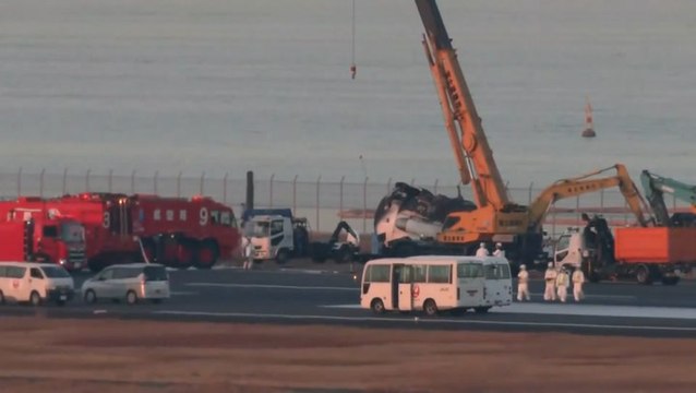 Japan Airlines wreckage continues to be cleared as crew search for flight recorder