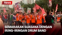 Pendukung Ganjar-Mahfud Semarakan Istora Senayan dengan Iring-iringan Drum Band