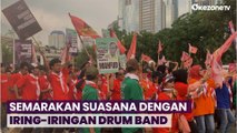Jelang Debat Capres di Istora Senayan, Pendukung Ganjar-Mahfud Semarakan Suasana dengan Iring-iringan Drum Band