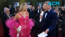 Margot Robbie stuns in 'Barbie' pink at the Golden Globes 2024 red carpet!