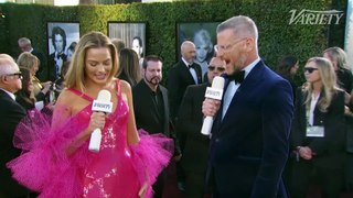 Margot Robbie Cant Believe the $1.4 Billion Success of Barbie on the Golden Globes Red Carpet