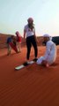 Sandboarding in Dubai safari desert with Al Qudra Tours