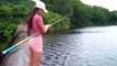 Amazing Fishing. Traditional Fishing Girl catches Big Fish. Hook Fishing