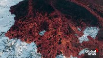 Iceland volcano_ Mesmerizing drone video shows bubbling lava swallow road near Blue Lagoon720p