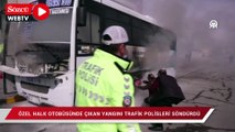 Özel halk otobüsünde çıkan yangını trafik polisleri söndürdü