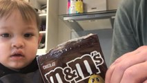 Little boy learns the secret ingredient to the perfect cookies while baking with dad