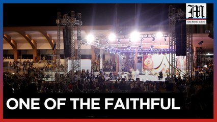 Actor Coco Martin speaks to fellow Nazarene devotees