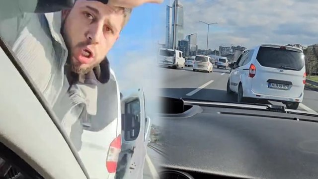 Öfkeli sürücü yolunu kestiği otomobilin camını yumrukladı