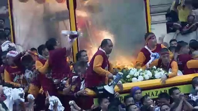 Philippine Catholics swarm Christ icon in mass parade