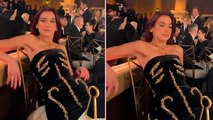 Dua Lipa shares funny Golden Globes clip as she struggles to sit down in designer dress