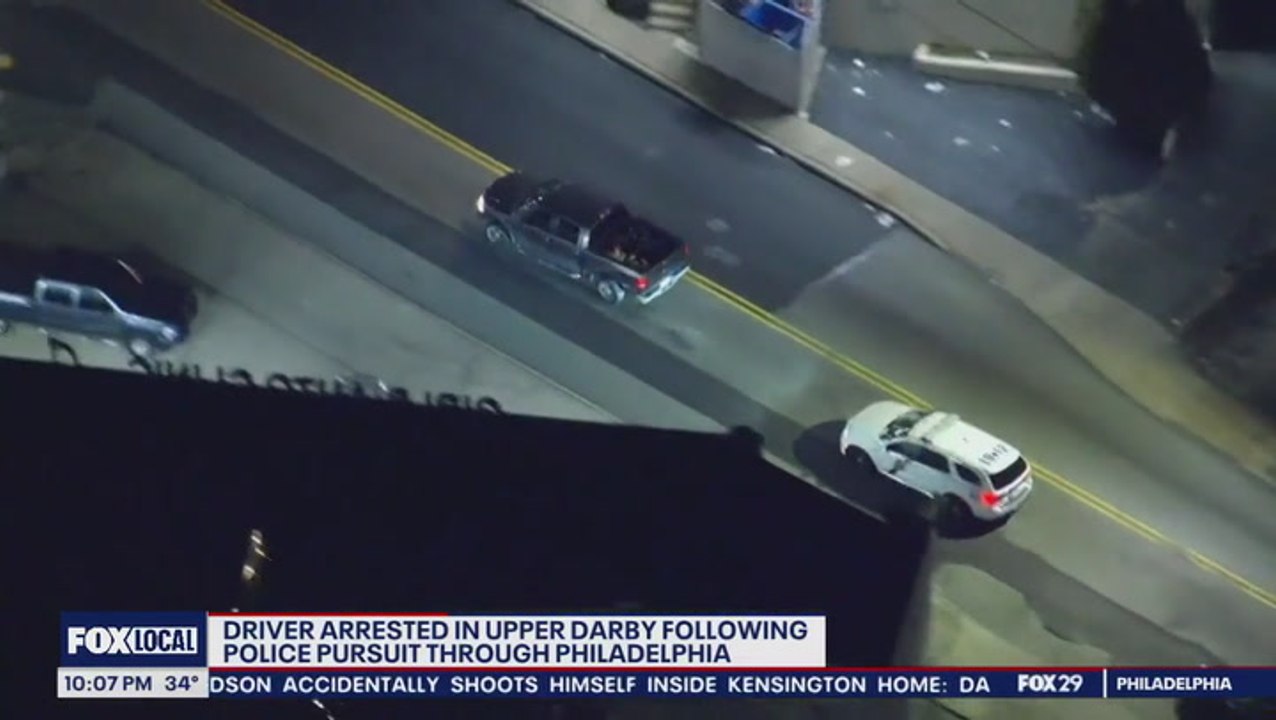 Police car chase through streets of Philadelphia ends in dramatic foot pursuit