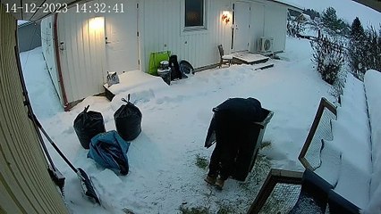 Woman Gets Stuck in Garbage Bin