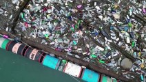 Floating waste dump in Bosnia threatens health, tourism